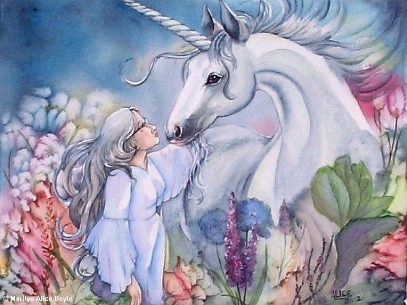 girl with unicorn in garden