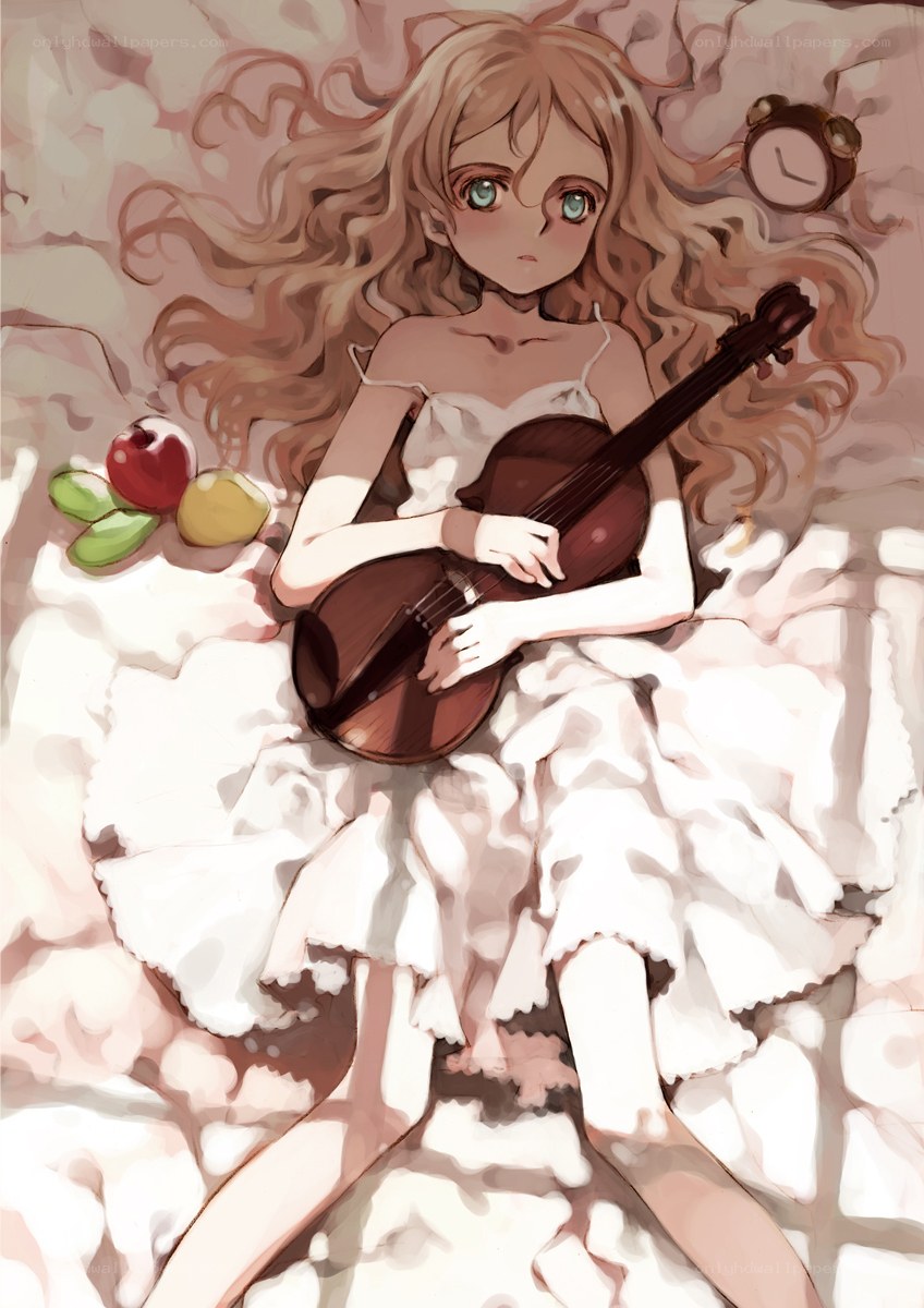Girl with violin on bed