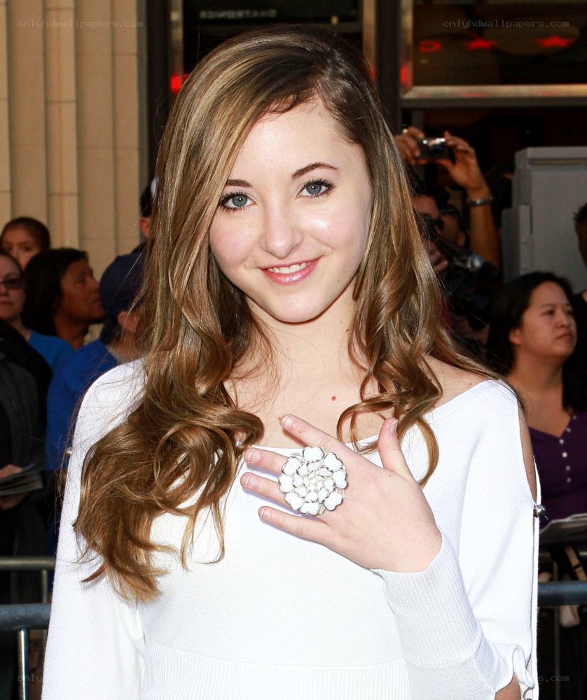 girl with white flower ring