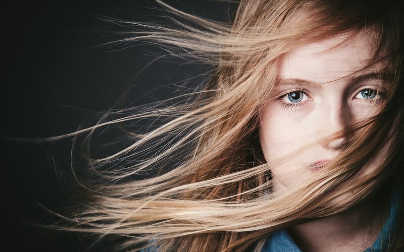 girl with wind-blown hair
