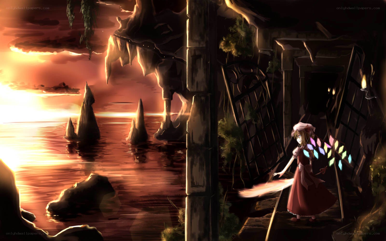 girl with windmill at sunset