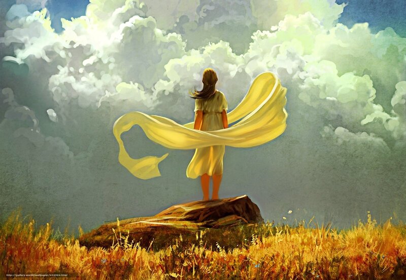 Girl with yellow scarf in field