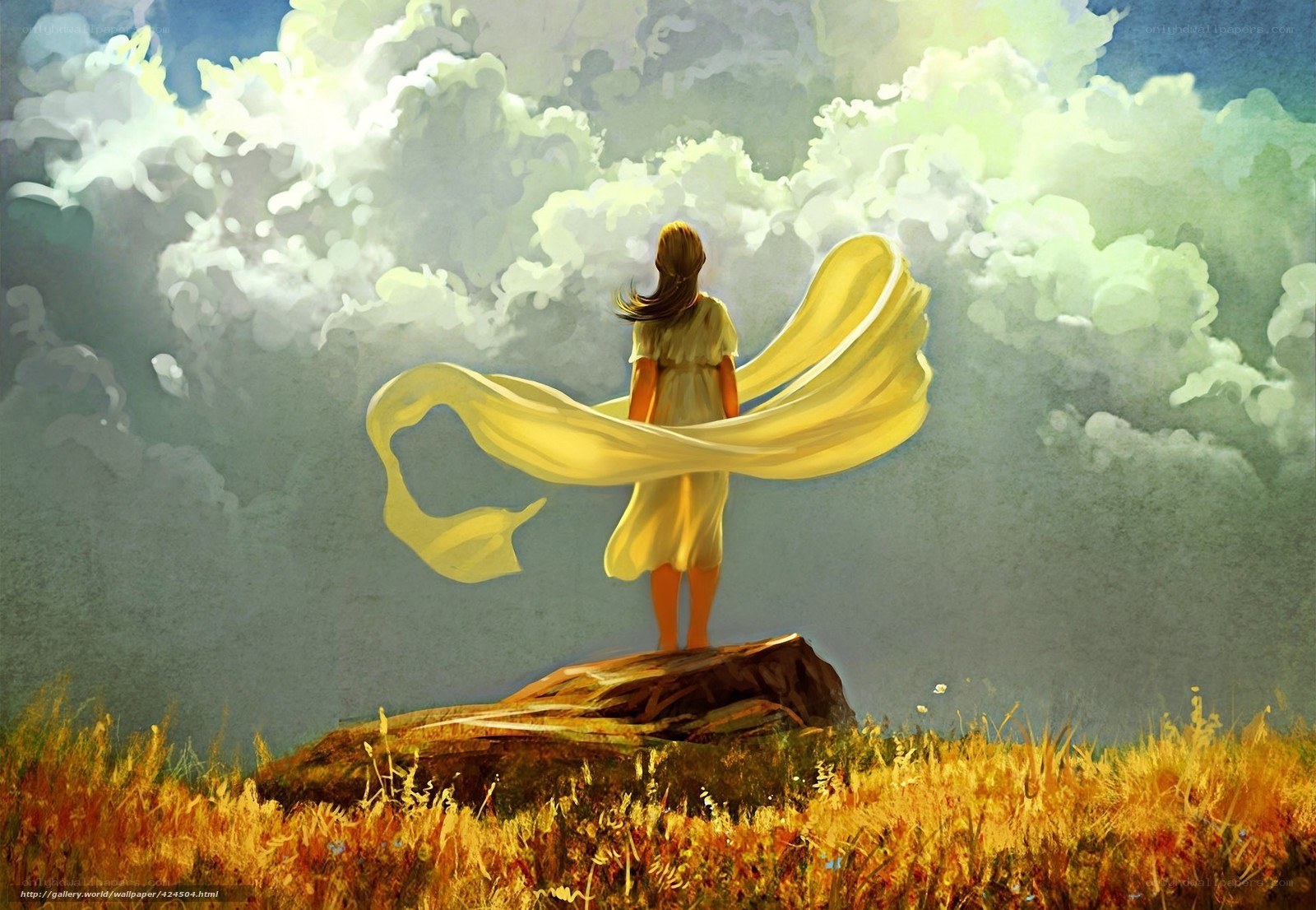 Girl with yellow scarf in field
