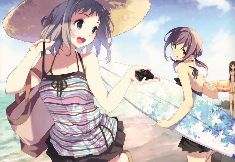 Girls at the beach with surfboards