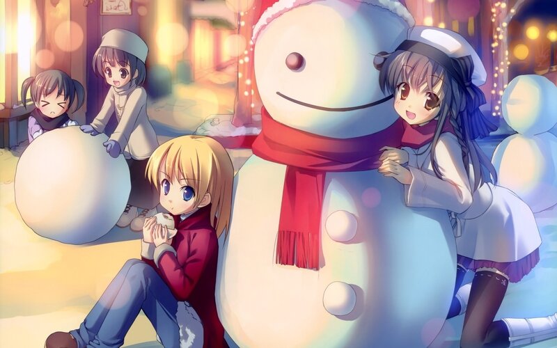 Girls building a snowman