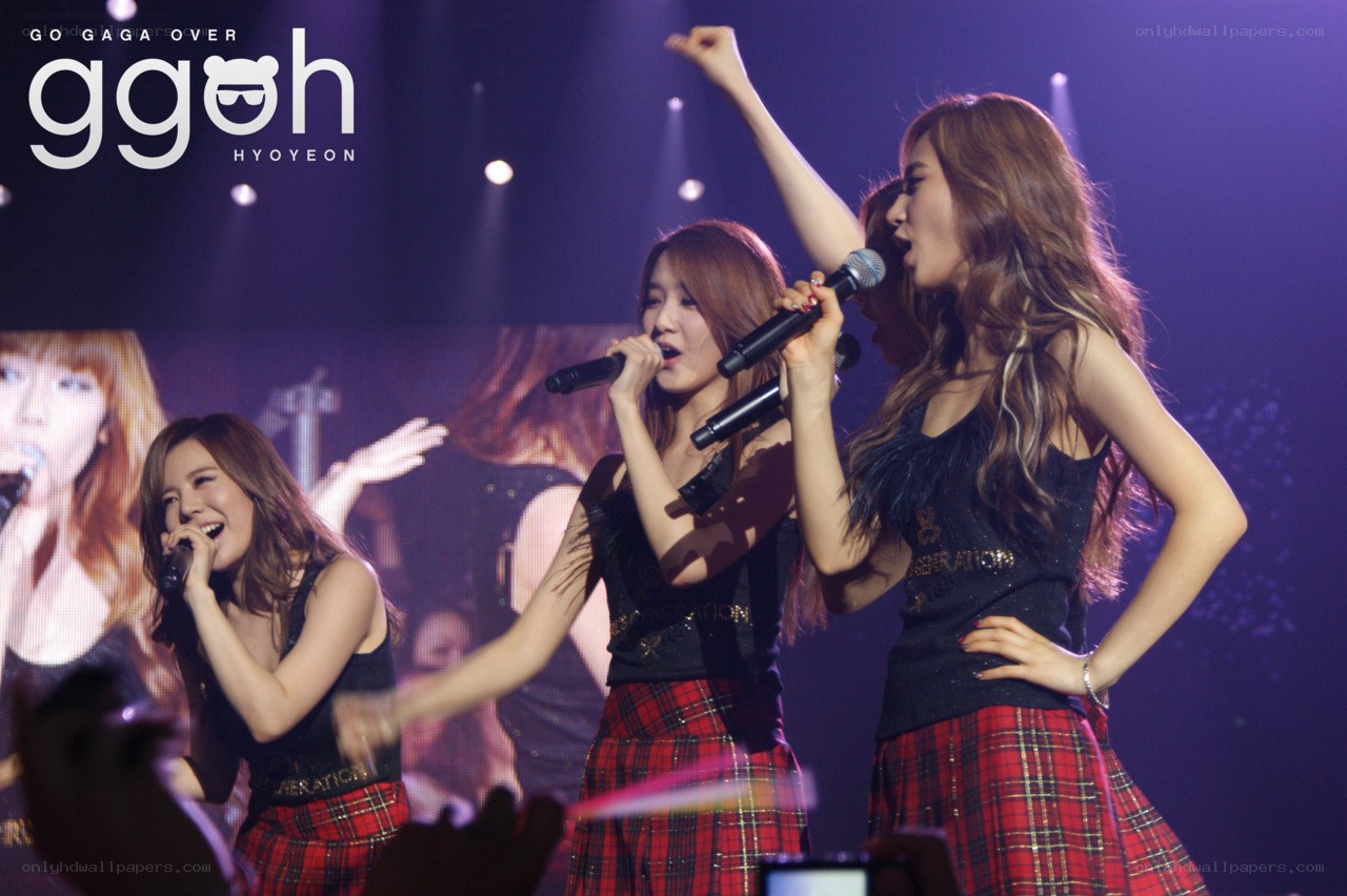 girls generation performing on stage