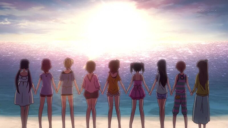 girls holding hands at sunset