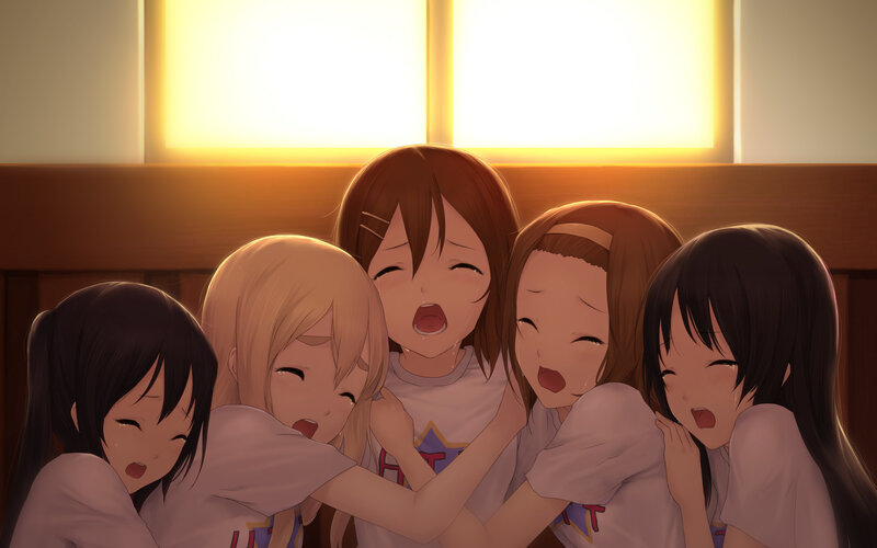 girls hugging in warm light