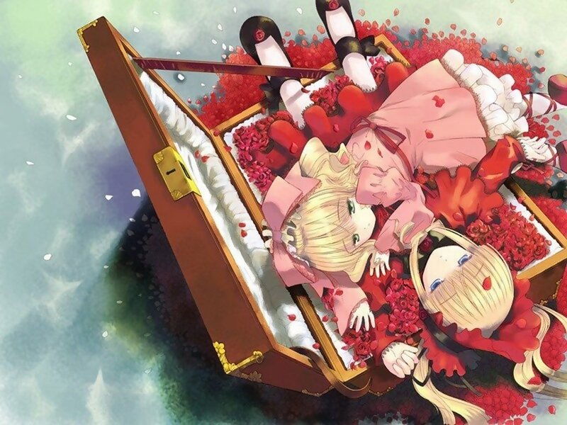 girls in a coffin with roses