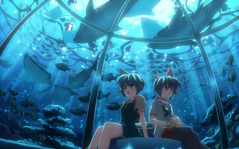 girls in aquarium tunnel