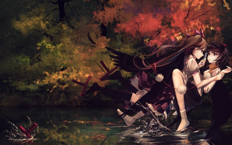 Girls in autumn forest