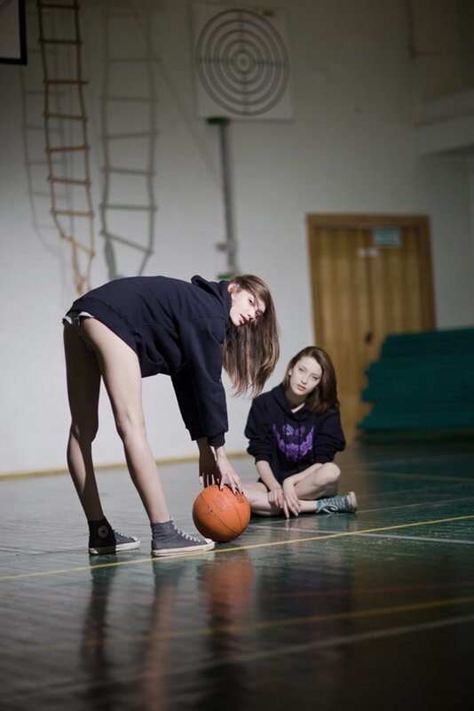 Girls in gym with basketball