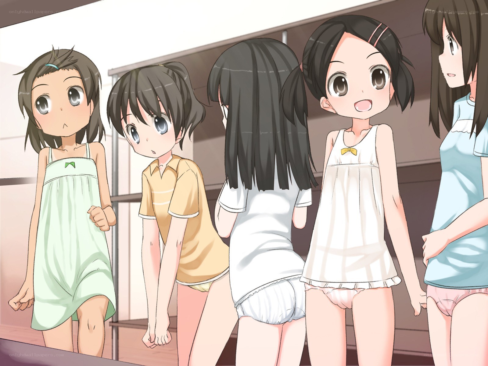girls in pajamas standing