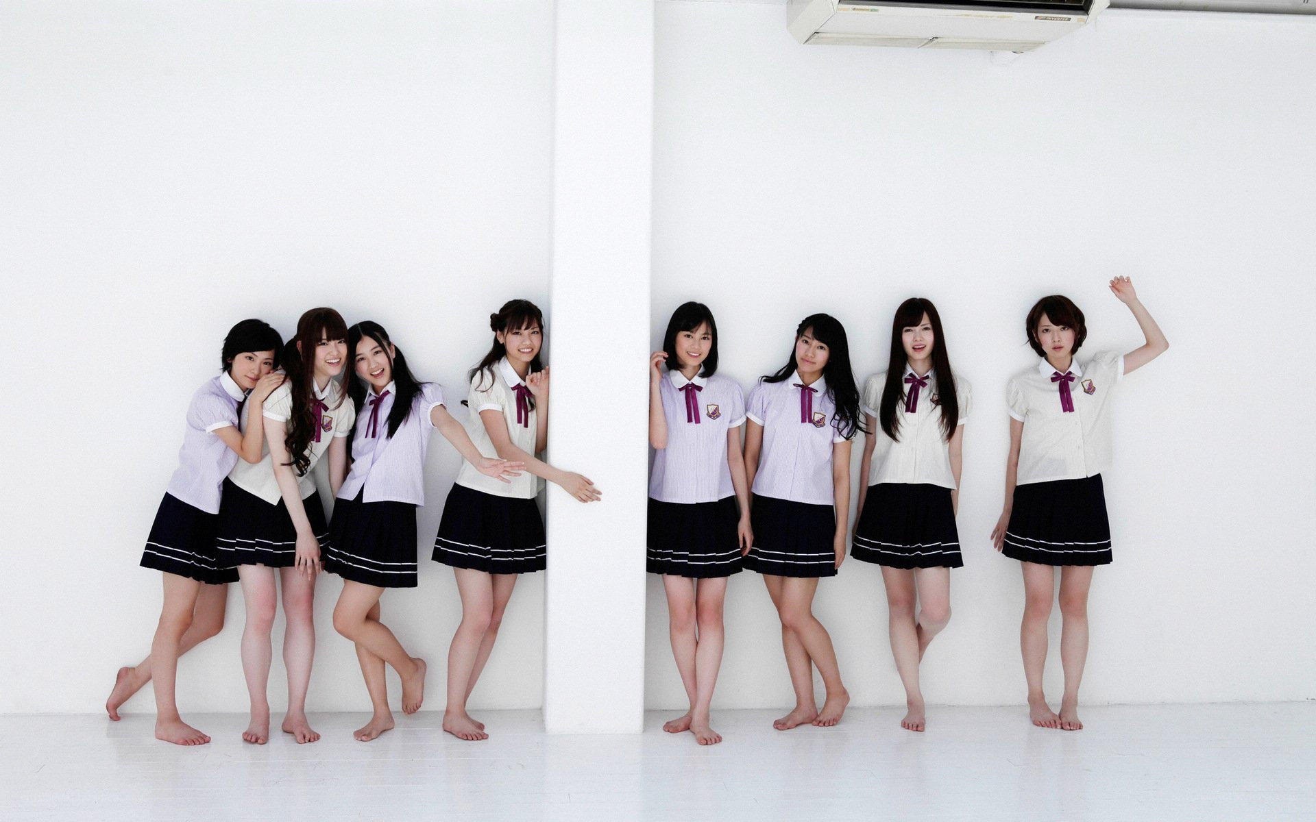 girls in school uniforms