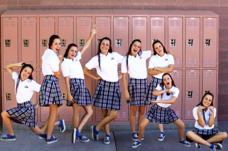 Girls in School Uniforms — White, Playful