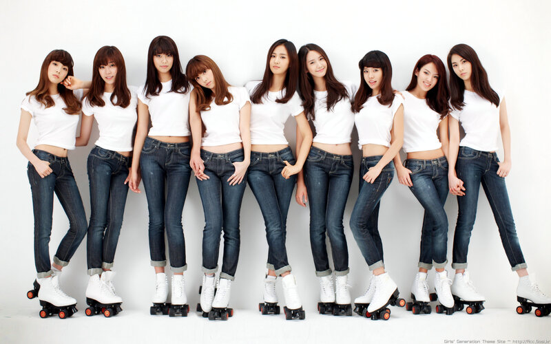 Girls in white shirts and jeans