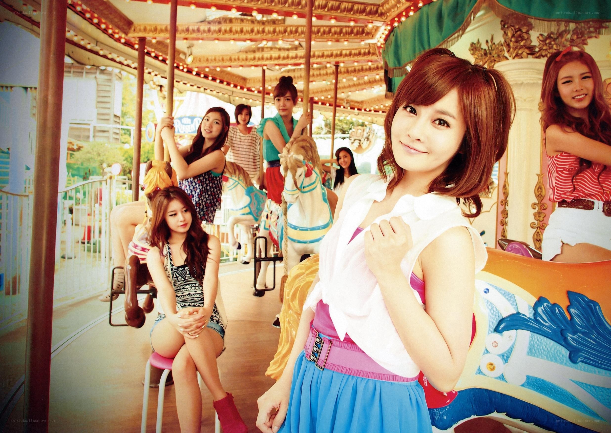 Girls on a carousel