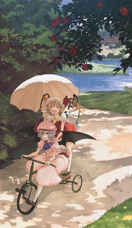 Girls on a tricycle ride