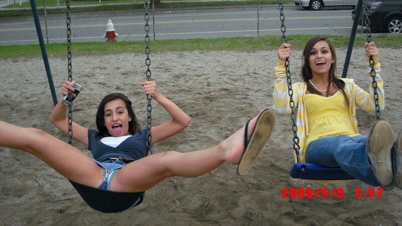 Girls on swings at playground