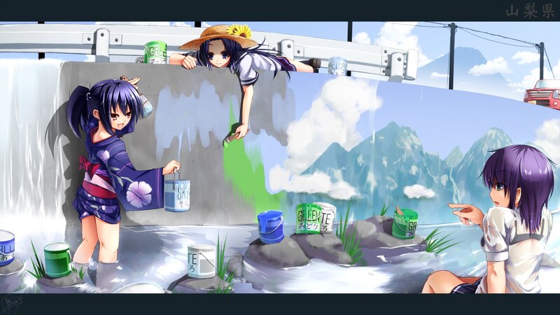 Girls painting a mural