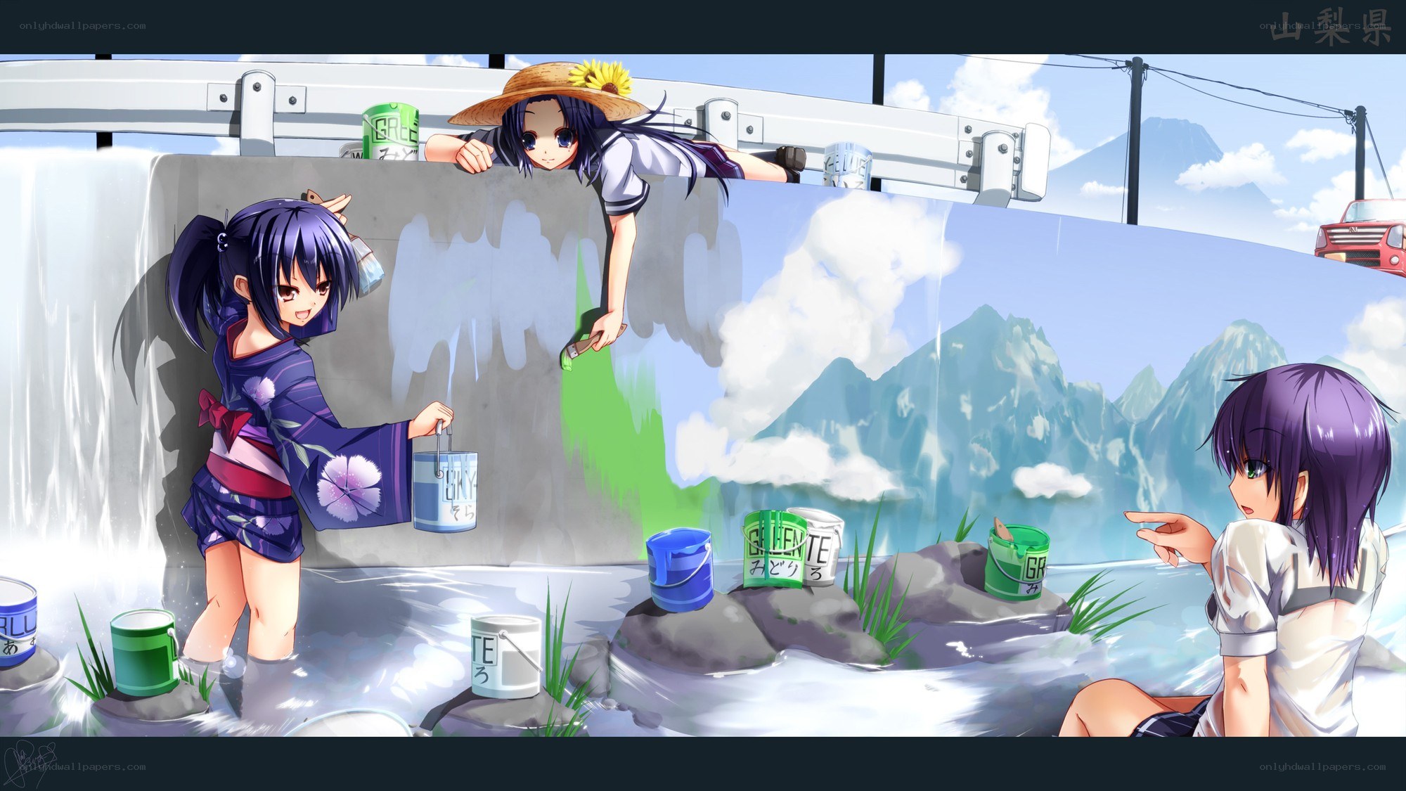 Girls painting a mural
