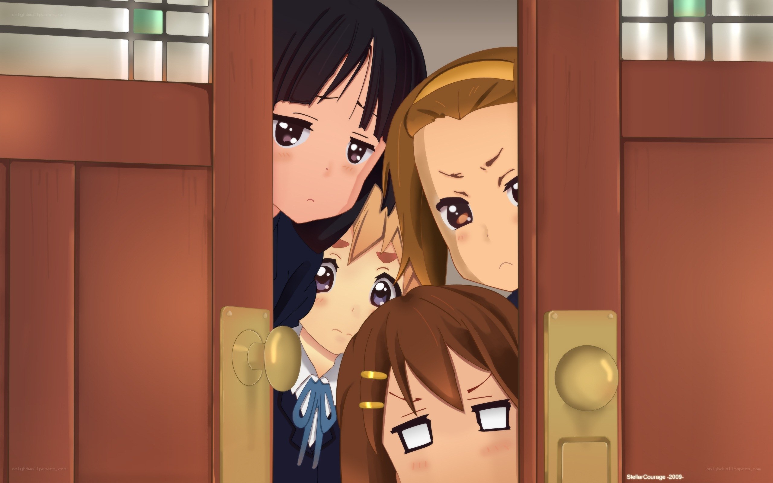 girls peeking through door