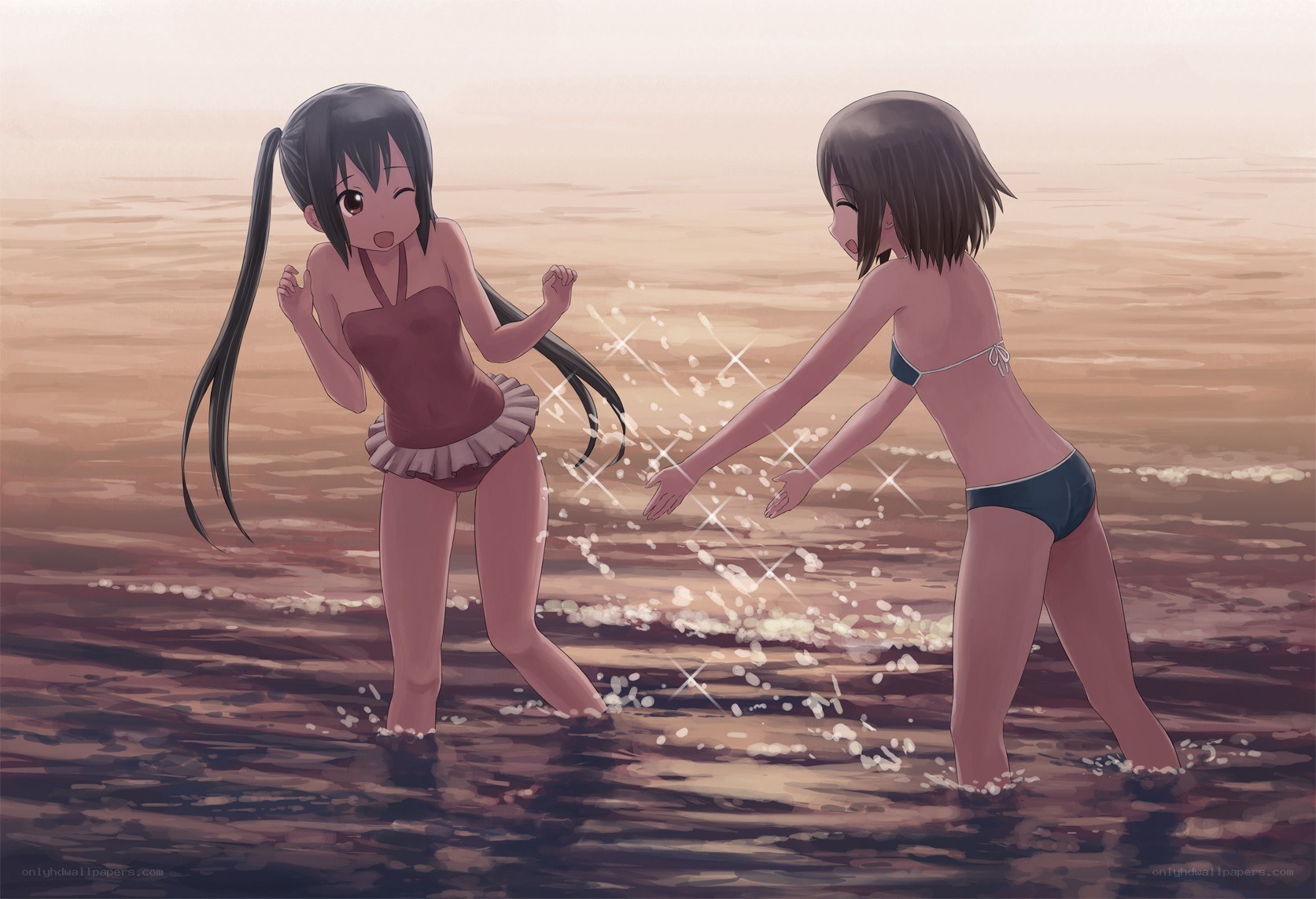 Girls playing at the beach