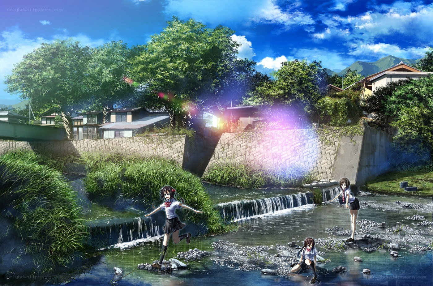 Girls playing by a river