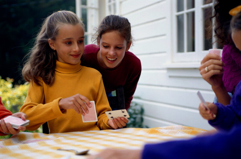 Girls Playing Cards