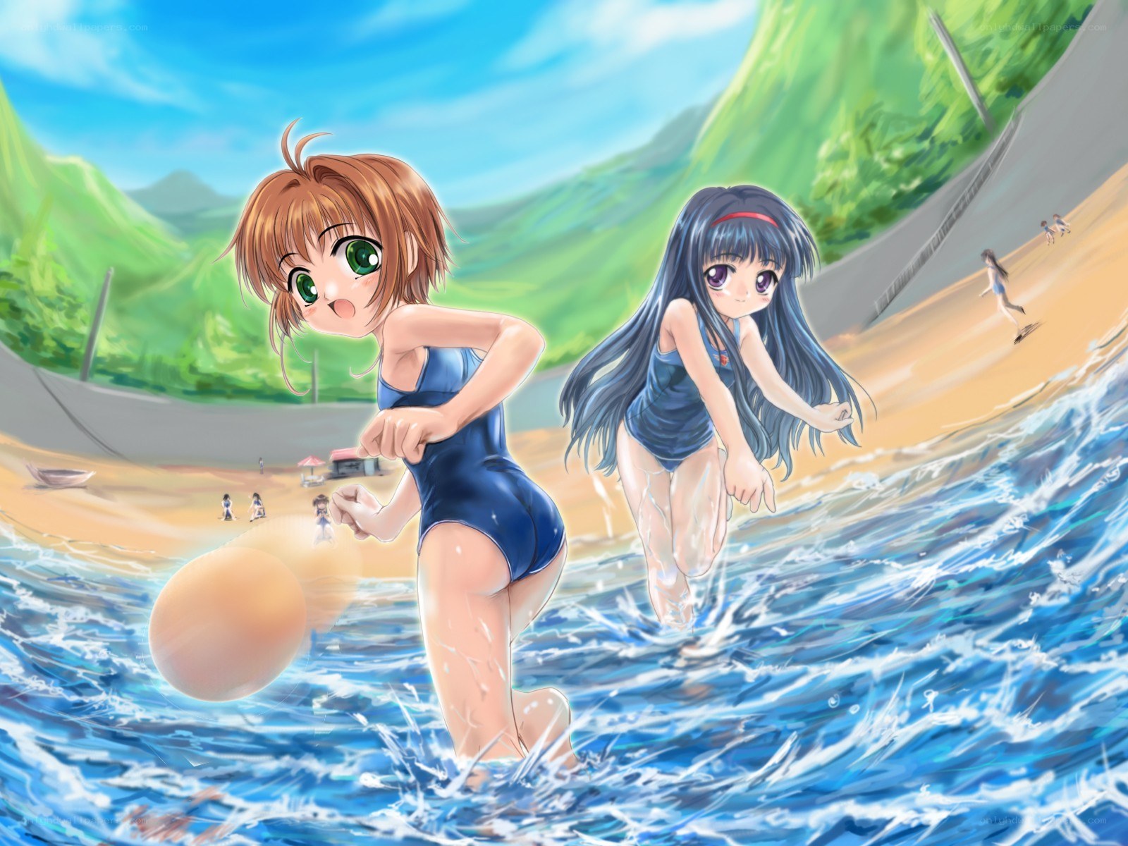 Girls playing in the ocean