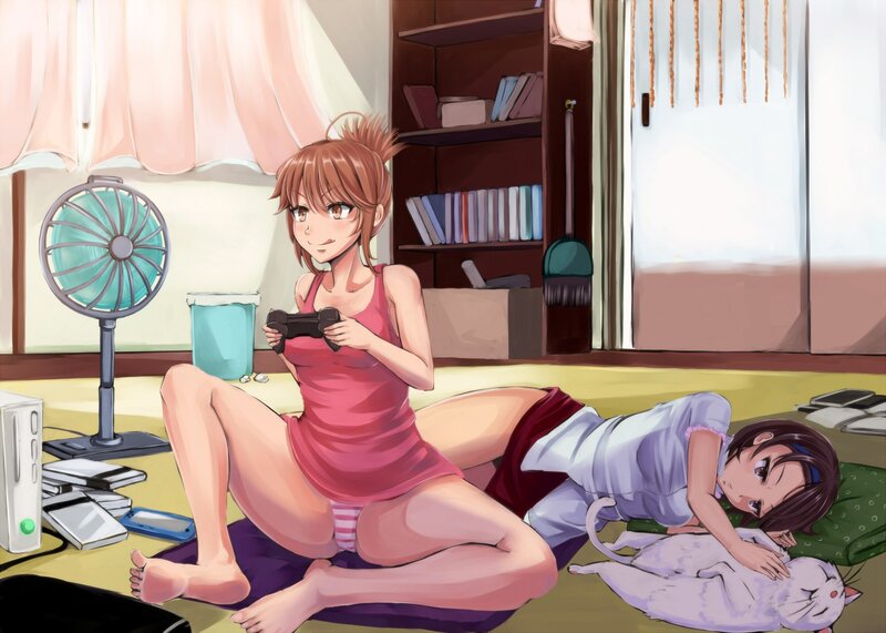Girls playing video games at home