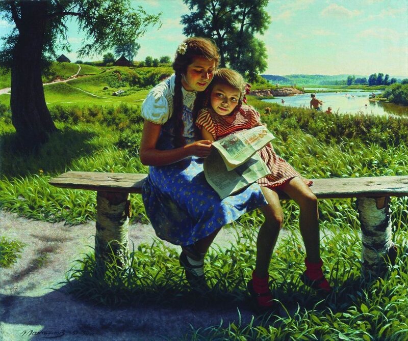 Girls reading by the river