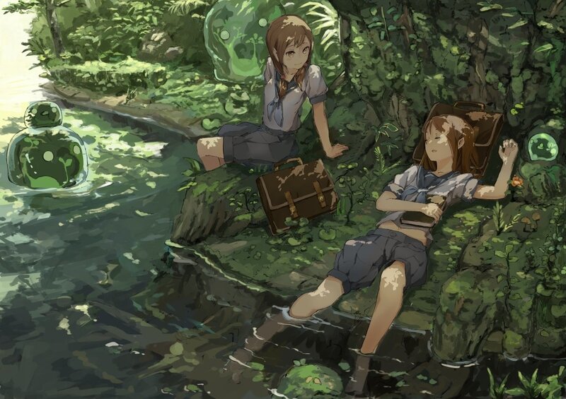 Girls relaxing by a stream