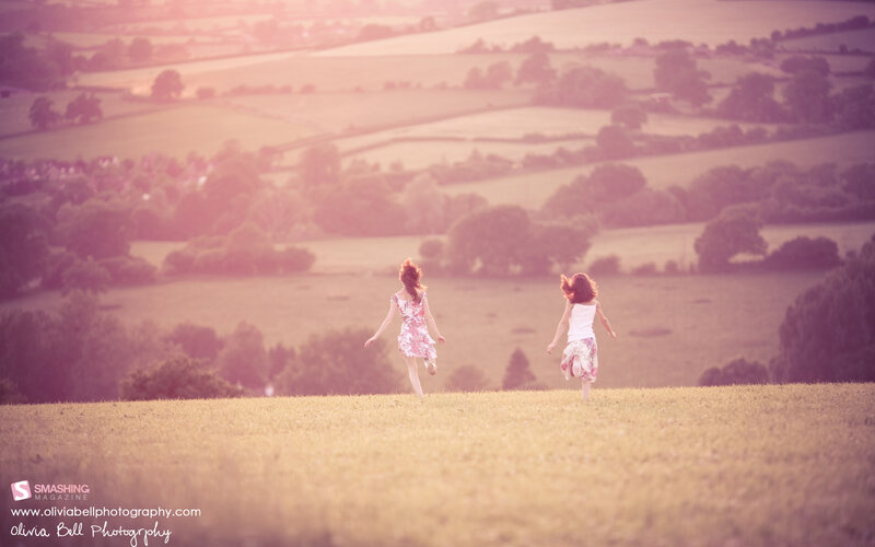 Girls running in a field