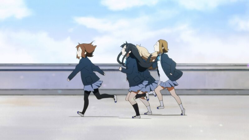 girls running in school uniforms