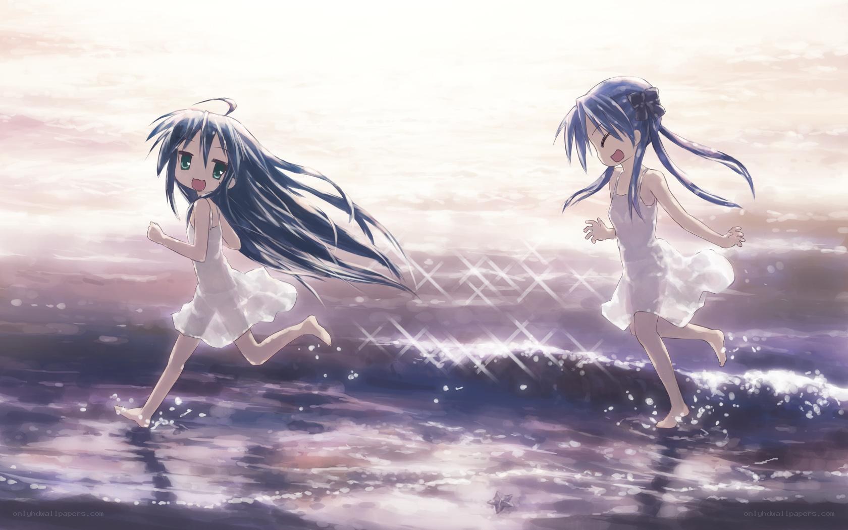 girls running on beach