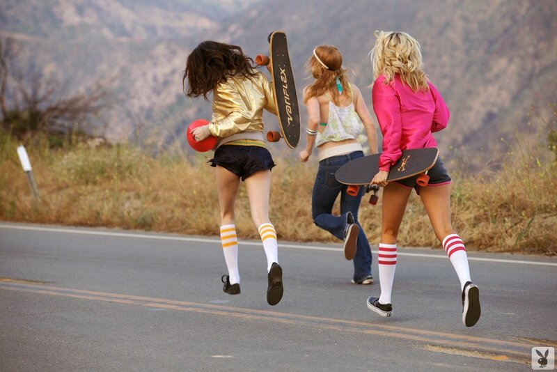 girls running with skateboards