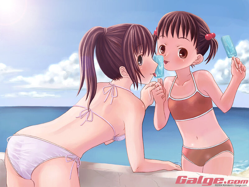girls sharing ice cream at beach