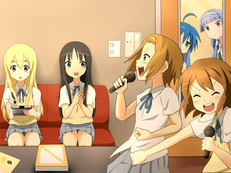 Girls singing karaoke together