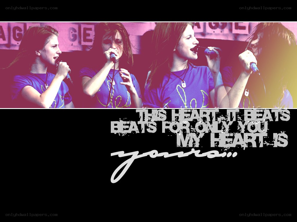 girls singing on stage