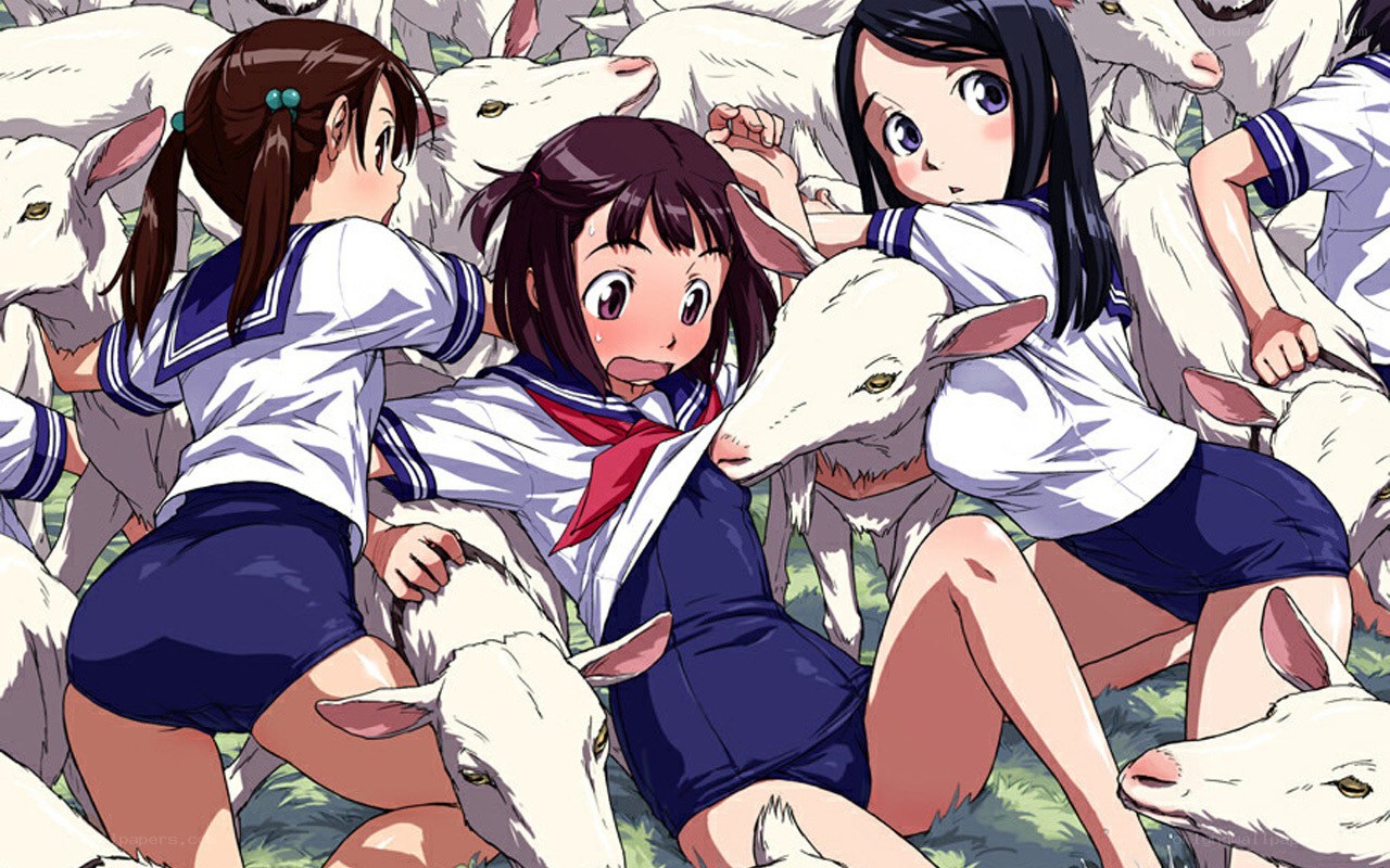 girls surrounded by goats