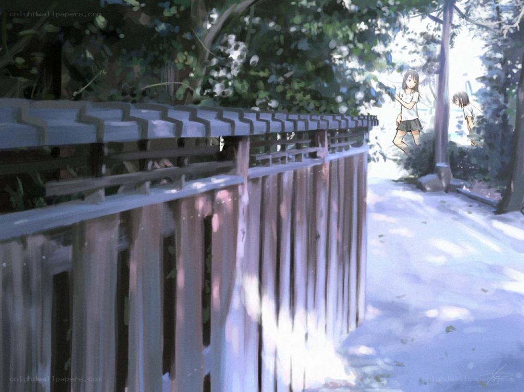 Girls walking on a sunlit path