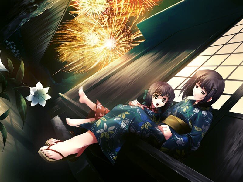 Girls watching fireworks from a porch