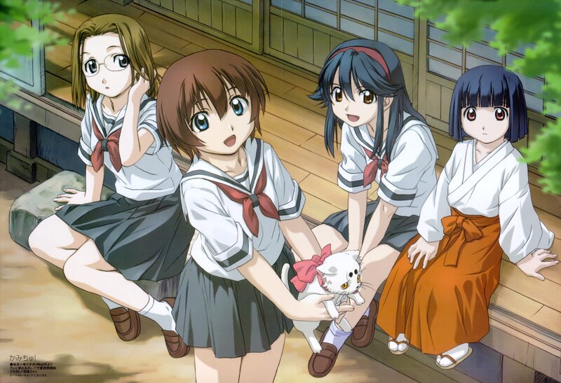 girls with a kitten on porch