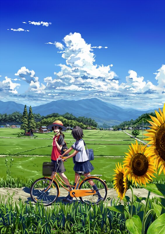 Girls with bicycle in sunflower field