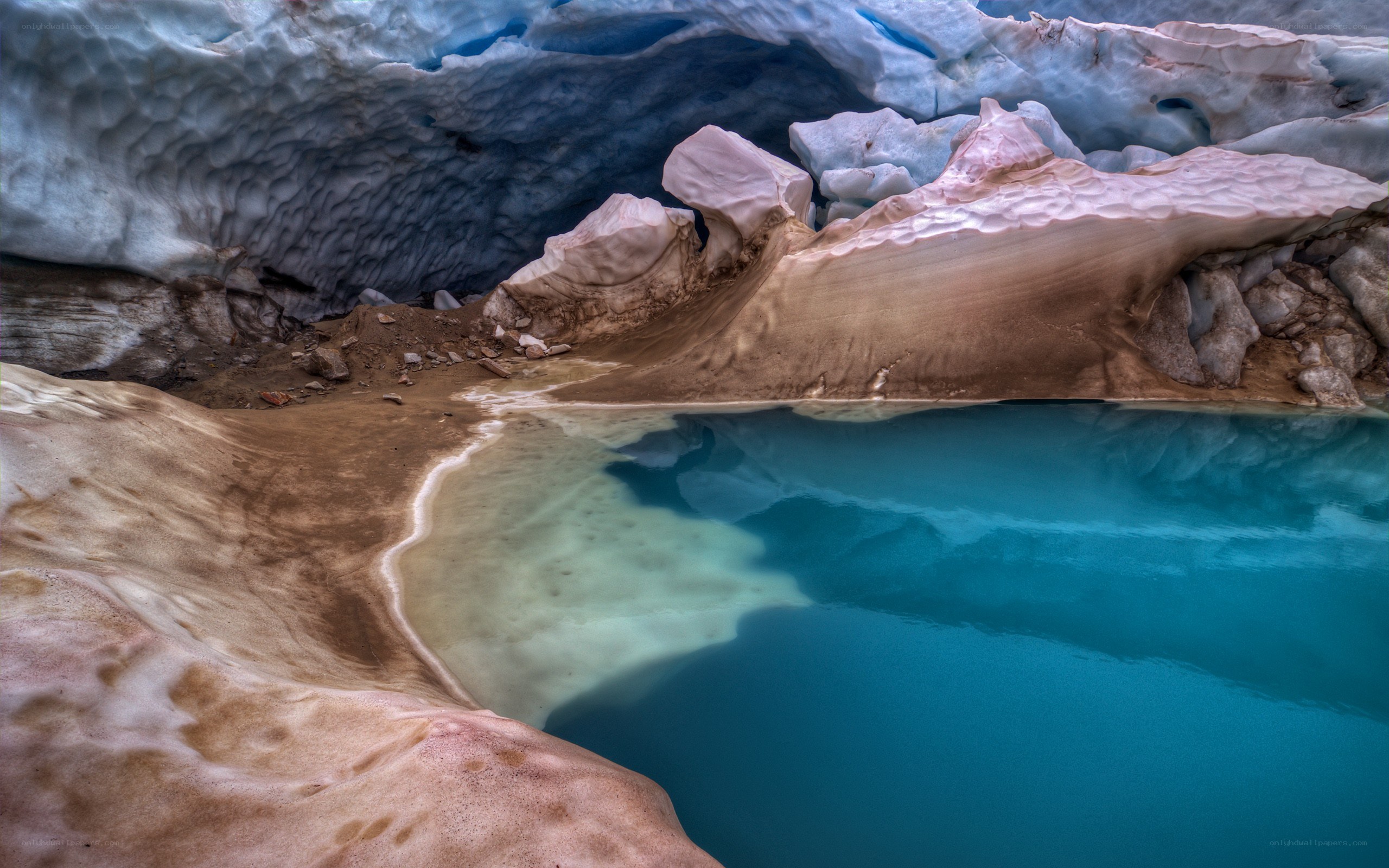 glacial lake under ice cave