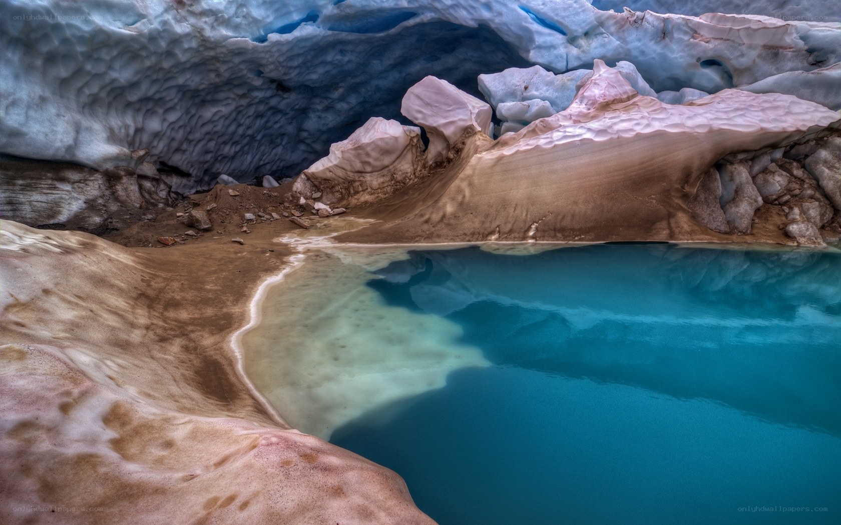 glacial lake under ice cave