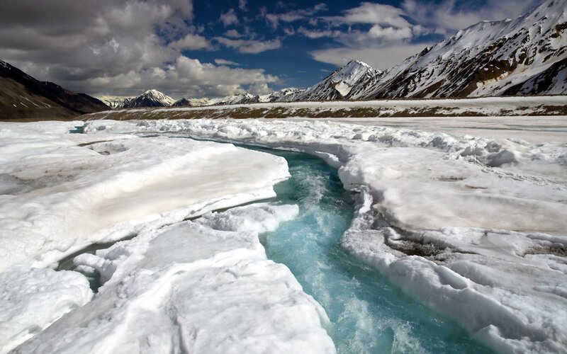 Glacial River in Snow