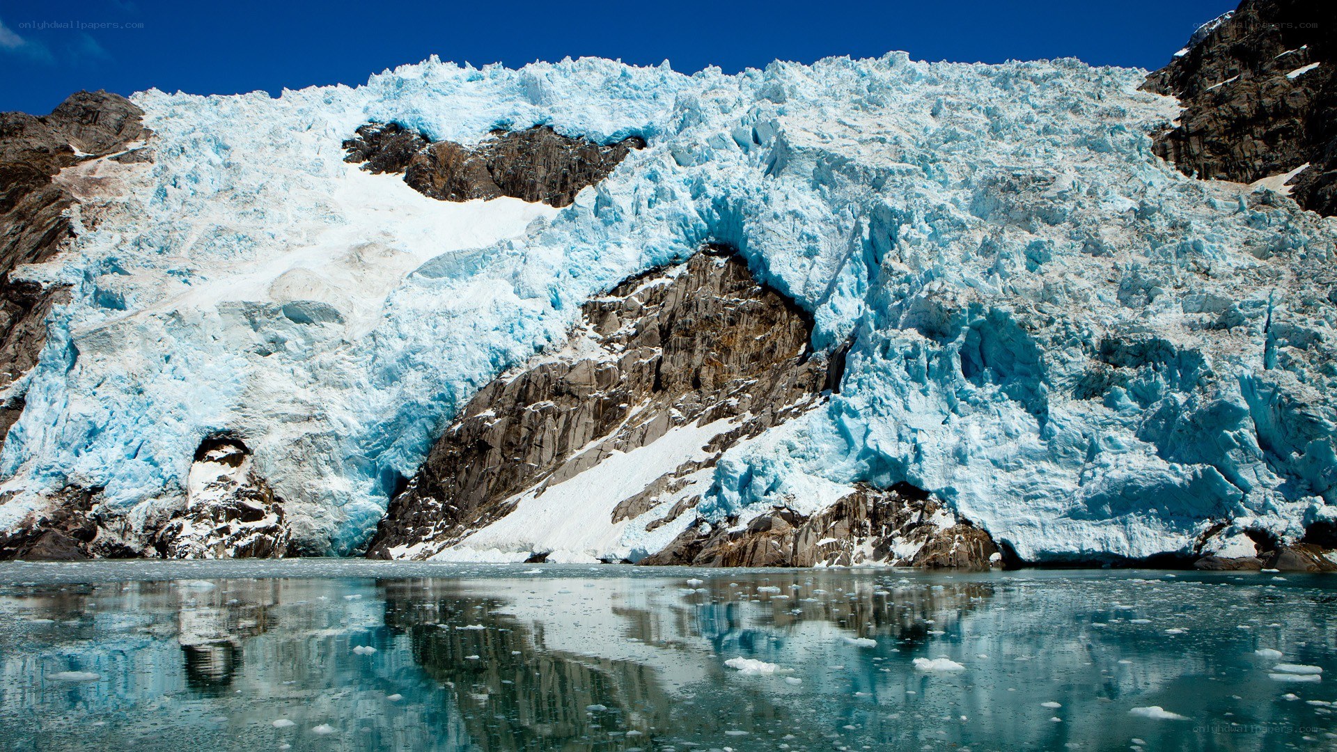 Glacier calving into a lake