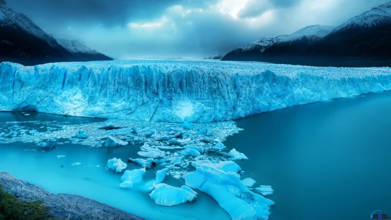 Glacier Calving into Lake — Blue, Dramatic, Photograph